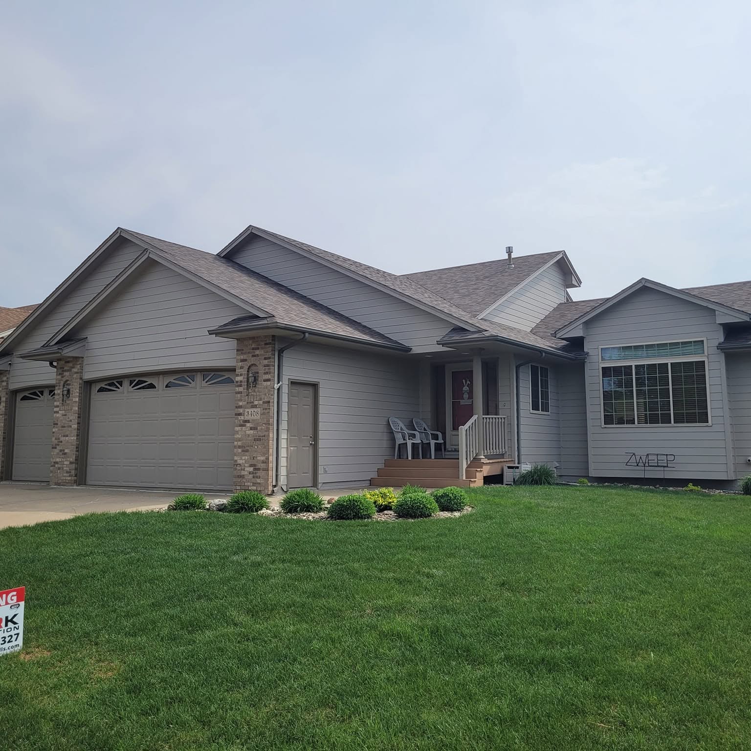 A finished Sioux Falls home with a new roof by Clark Roofing & Construction